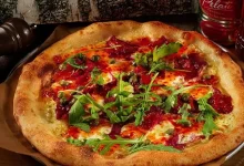 Photo of Рецепт сырной пиццы с ветчиной и ананасом